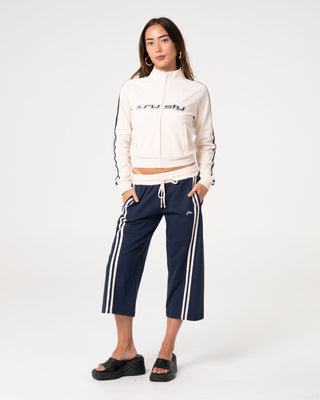 Woman wearing Maneater Fitted Zip Through Track Jacket in Egret