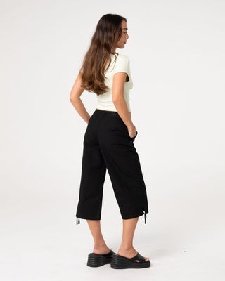 Woman wearing Cameron Low Rise Relaxed Capri Pant in Black