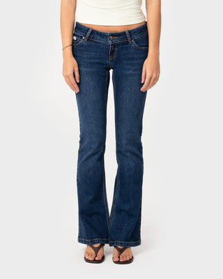 Woman wearing Lindsay Low Rise Boot Leg Denim Jean in Walk Of Shame