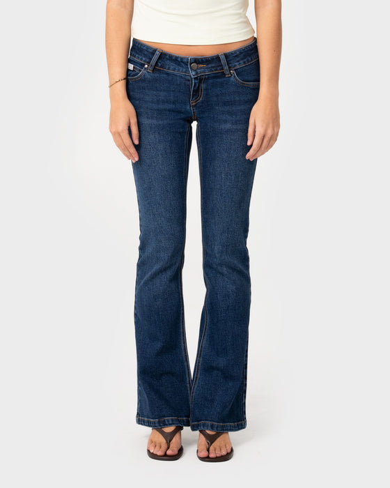 woman-wearing-lindsay-low-rise-boot-leg-denim-jean-in-walk-of-shame