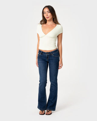 Woman wearing Lindsay Low Rise Boot Leg Denim Jean in Walk Of Shame