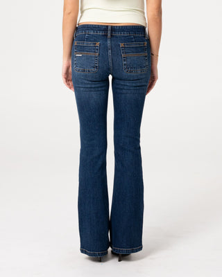 Woman wearing Lindsay Low Rise Boot Leg Denim Jean in Walk Of Shame