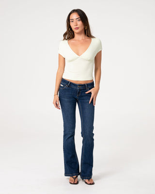 Woman wearing Lindsay Low Rise Boot Leg Denim Jean in Walk Of Shame