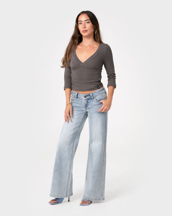 woman-wearing-lori-super-low-rise-wide-leg-denim-jean-in-worn-out