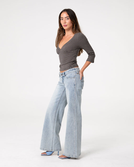 woman-wearing-lori-super-low-rise-wide-leg-denim-jean-in-worn-out