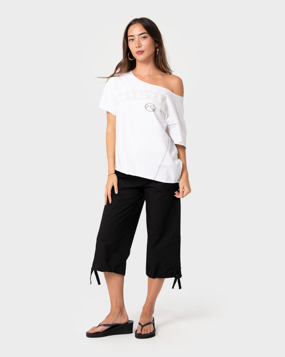 woman-wearing-kick-it-cut-off-shoulder-tee-in-vintage-white