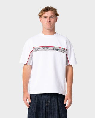 Man wearing Big Ticket Short Sleeve Tee in White