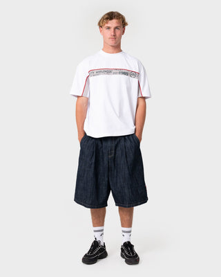 Man wearing Big Ticket Short Sleeve Tee in White