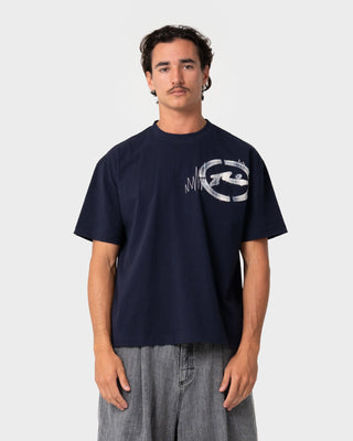 Man wearing Uncut Gems Short Sleeve Tee in Navy Blue