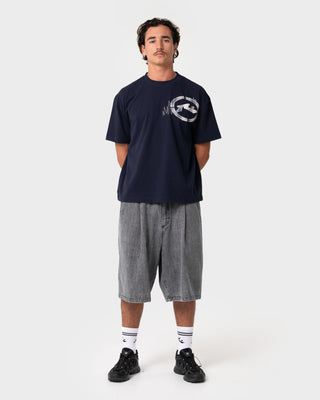 Man wearing Uncut Gems Short Sleeve Tee in Navy Blue