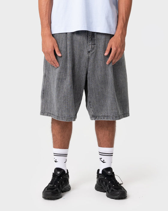 man-wearing-mista-slub-elastic-short-in-washed-black