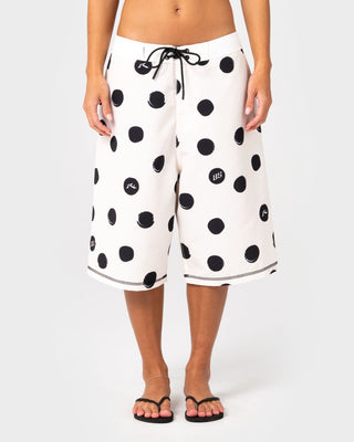 Woman wearing Phelps Fixed Waist Boardshort in Egret
