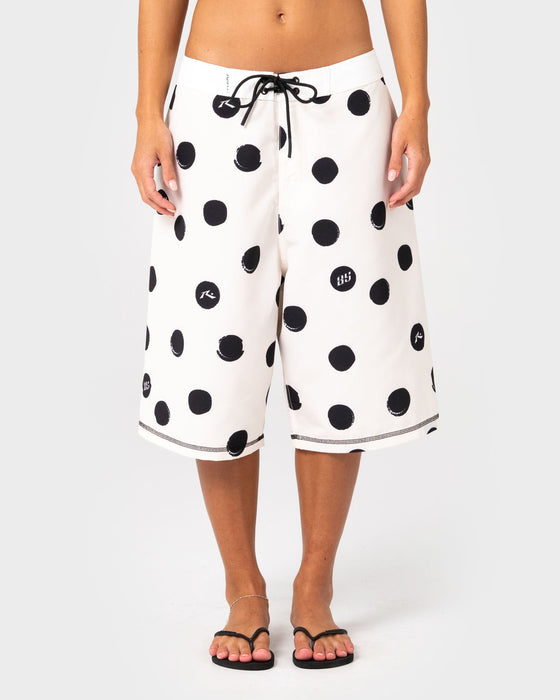 woman-wearing-phelps-fixed-waist-boardshort-in-egret