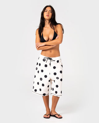 Woman wearing Phelps Fixed Waist Boardshort in Egret