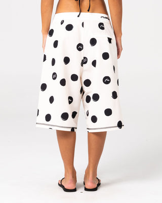 Woman wearing Phelps Fixed Waist Boardshort in Egret