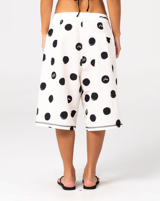 woman-wearing-phelps-fixed-waist-boardshort-in-egret