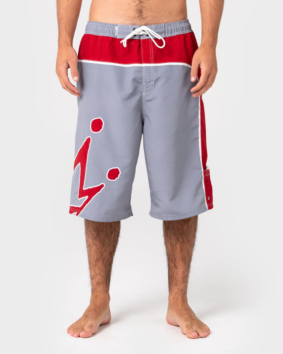man-wearing-downshift-hybrid-waist-boardshort-in-stone-grey