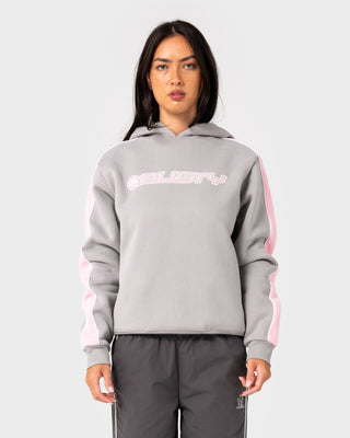 Woman wearing Timmy Target Oversize Hooded Fleece in Grey / Pink