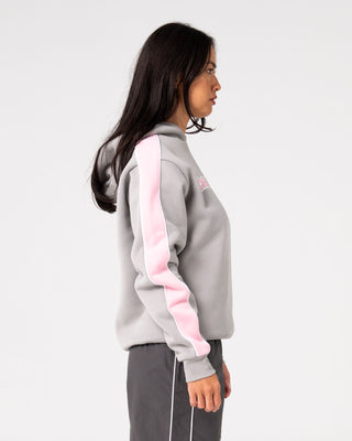 Woman wearing Timmy Target Oversize Hooded Fleece in Grey / Pink