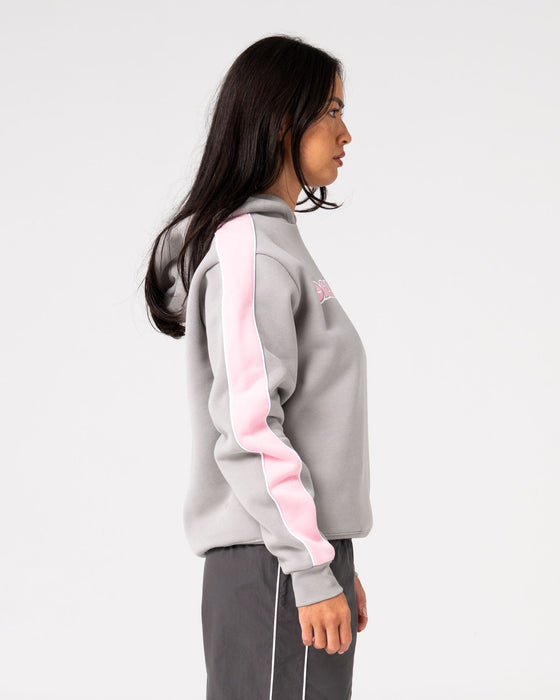 woman-wearing-timmy-target-oversize-hooded-fleece-in-grey-pink