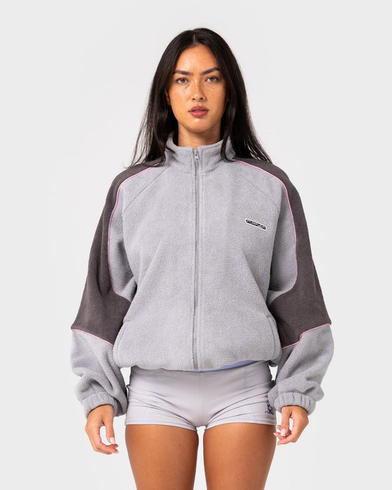 woman-wearing-coach-zip-through-sherpa-fleece-in-ultimate-grey