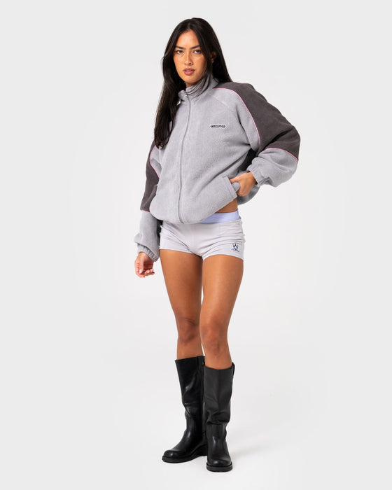 woman-wearing-coach-zip-through-sherpa-fleece-in-ultimate-grey