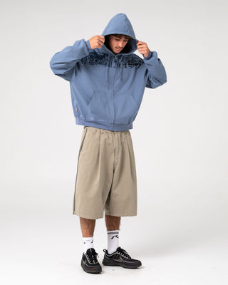 Man wearing Chief Keef Lightweight Zip-thru Hoodie in Shadow Blue