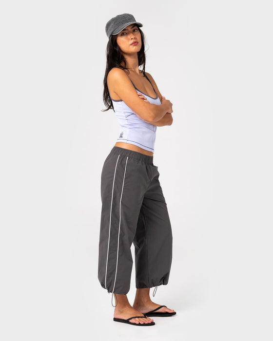woman-wearing-played-low-rise-capri-track-pant-in-carbon