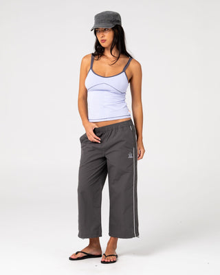 Woman wearing Played Low Rise Capri Track Pant in Carbon