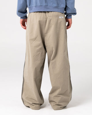 Man wearing Mista Ilavaline Elastic Pant in Putty