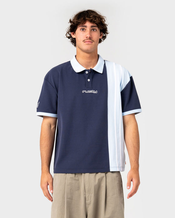 man-wearing-prestige-short-sleeve-polo-in-navy-blue