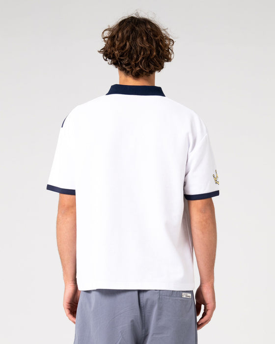 man-wearing-prestige-short-sleeve-polo-in-white