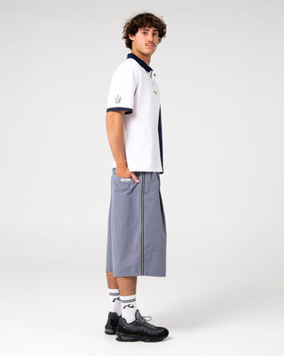 Man wearing Prestige Short Sleeve Polo in White