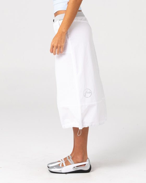 woman-wearing-player-low-rise-midi-skirt-in-white