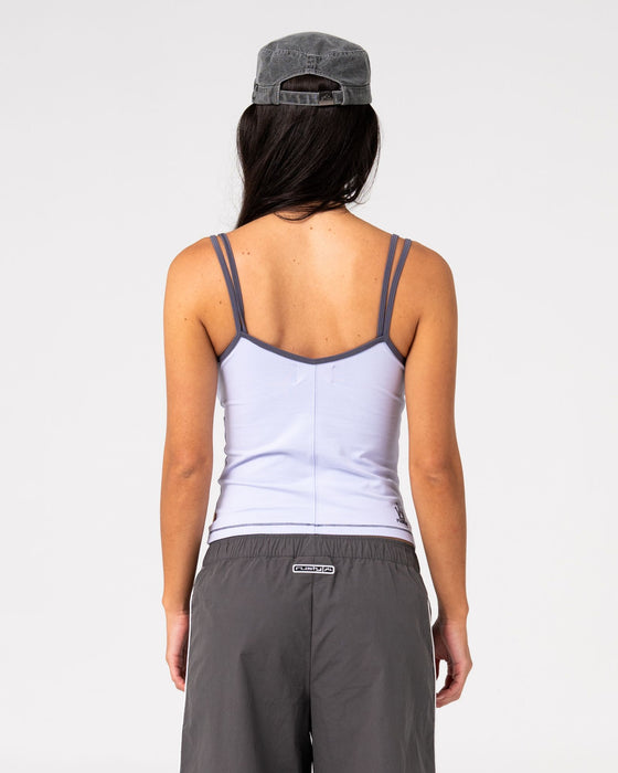 woman-wearing-serve-fitted-cami-tank-in-violet-blue
