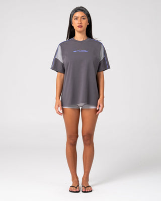 Woman wearing New Break 220 Oversize Tee in Carbon 2