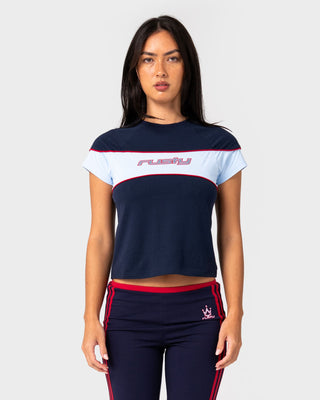 Woman wearing Kinetic Baby Tee in Navy Blue