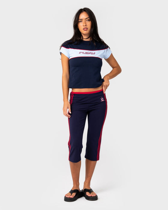 woman-wearing-kinetic-baby-tee-in-navy-blue