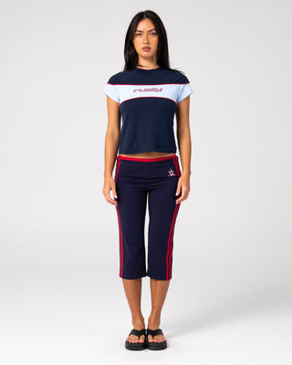 Woman wearing Kinetic Baby Tee in Navy Blue