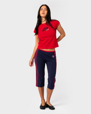 Woman wearing Alba Cap Sleeve Baby Tee in Vintage Red