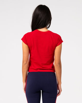 Woman wearing Alba Cap Sleeve Baby Tee in Vintage Red