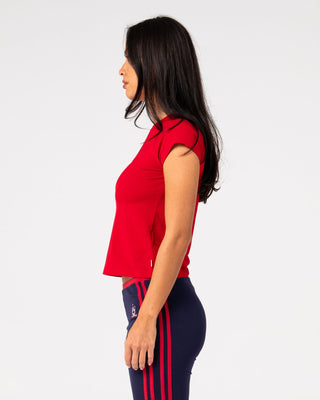 Woman wearing Alba Cap Sleeve Baby Tee in Vintage Red