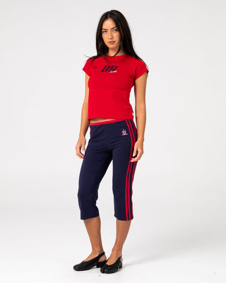 Woman wearing Alba Cap Sleeve Baby Tee in Vintage Red