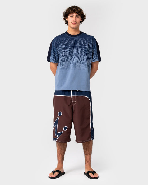 man-wearing-shadowfax-short-sleeve-tee-in-shadow-blue