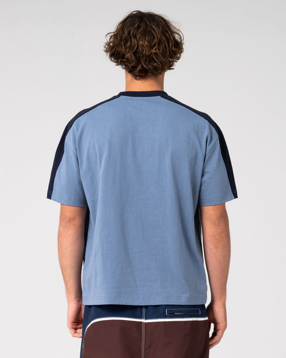 man-wearing-shadowfax-short-sleeve-tee-in-shadow-blue