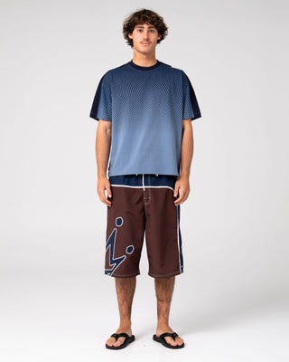 Man wearing Shadowfax Short Sleeve Tee in Shadow Blue