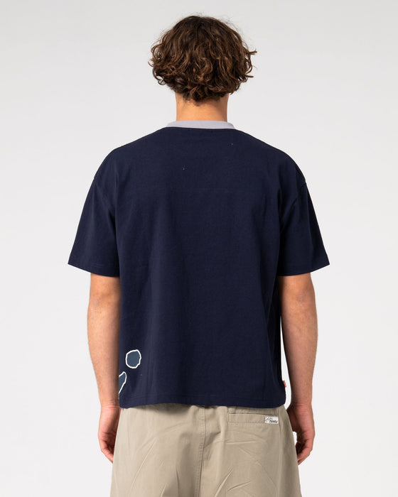 man-wearing-downshift-short-sleeve-tee-in-navy-blue