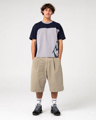 Man wearing Downshift Short Sleeve Tee in Navy Blue