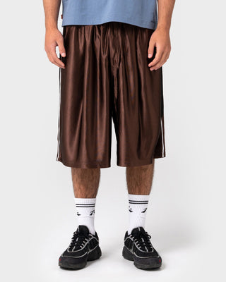 Man wearing Vinsanity Elastic Basketball Short in Brown
