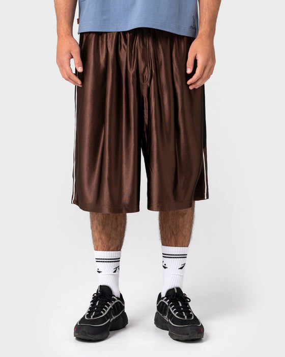 man-wearing-vinsanity-elastic-basketball-short-in-brown